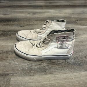 Vans High-Top Sneakers in Cream and Black